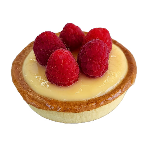 Raspberry Lemon Tart with golden shortbread crust, smooth yellow lemon curd filling, and fresh red raspberries arranged on top