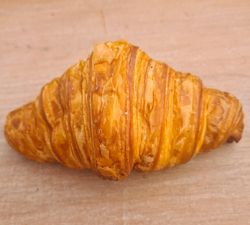 Golden traditional French butter croissant with flaky layers – artisan bakery Brisbane & Gold Coast